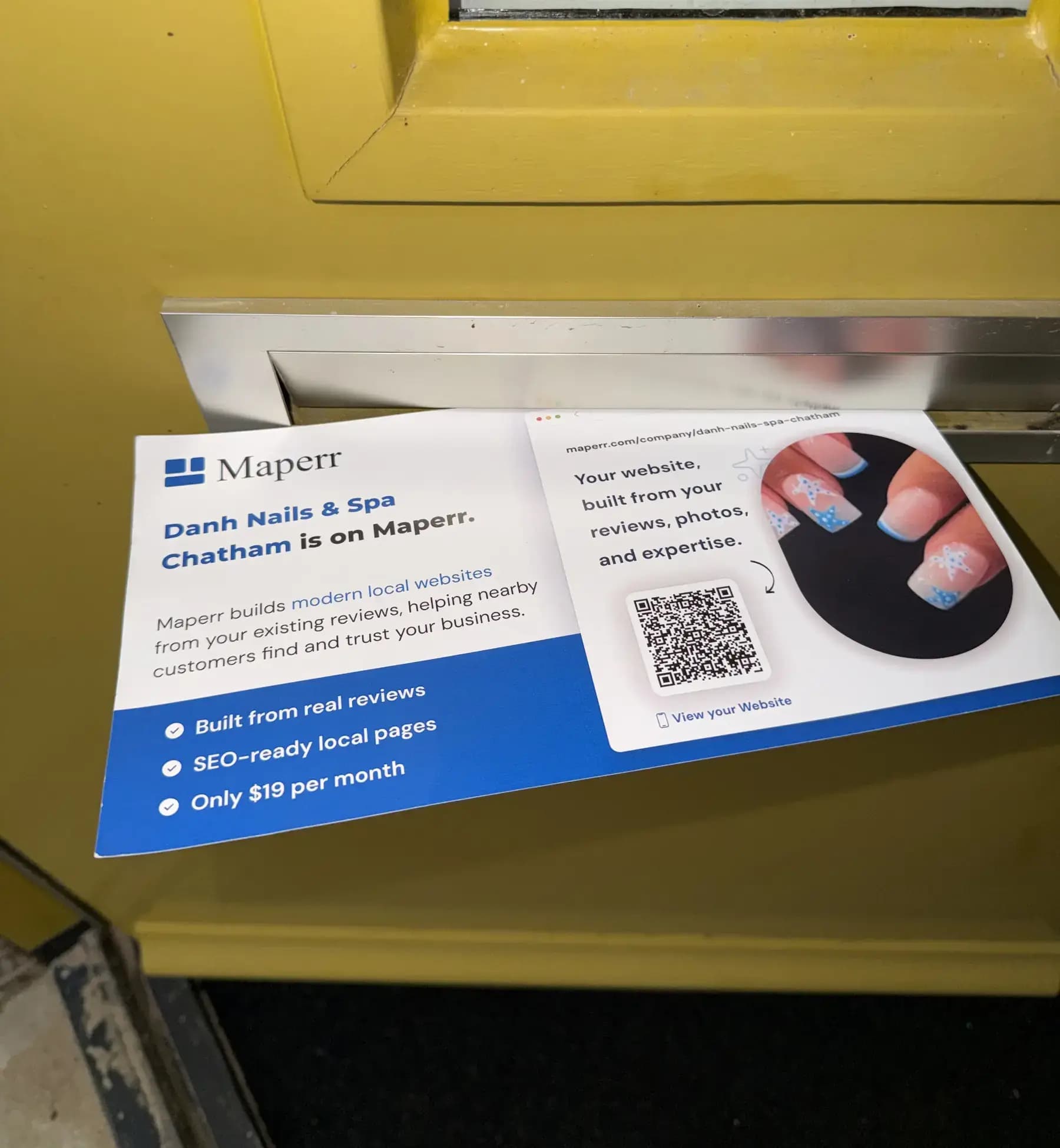 Maperr personalized postcard being delivered through a mail slot